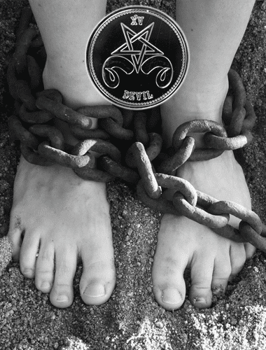 Bare feet bound in loose chains
